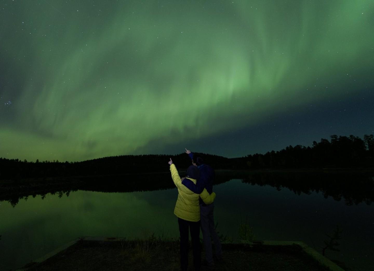 admiring northern lights in Ivalo