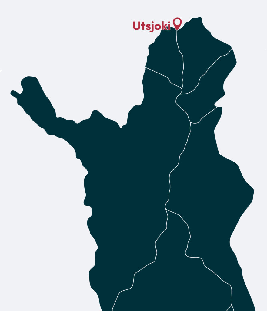 A stylized dark teal map highlights Utsjoki in northern Finland with a red marker and label. White lines trace major borders or roads, while the light gray background accentuates Utsjoki’s remote location.